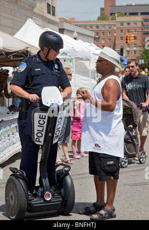 Police Officer Patrols on a Segway Stock Photo