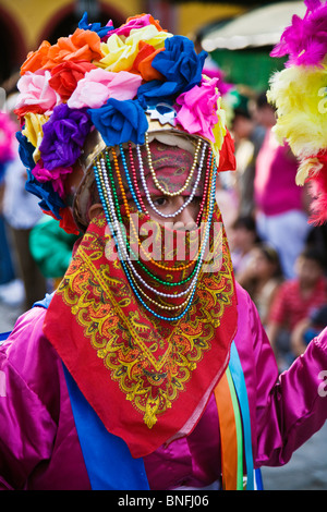 Tribal dance troupes come from all parts of Mexico at the INDEPENDENCE DAY PARADE - SAN MIGUEL DE ALLENE MEXICO Stock Photo