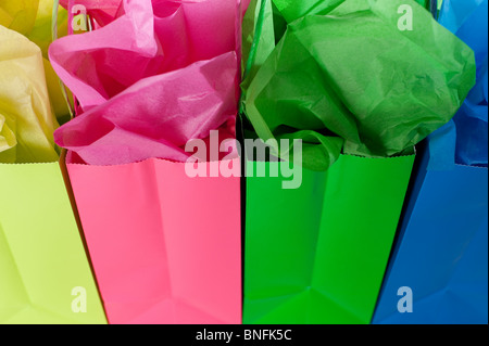 MultiColored Gift Bags with colorful tissue studio image Stock Photo