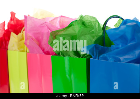 Multicolored Gift Bags with colorful tissue studio image Stock Photo