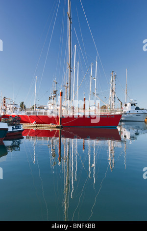 Boats in Brookings Harbor with reflection. Oregon Stock Photo