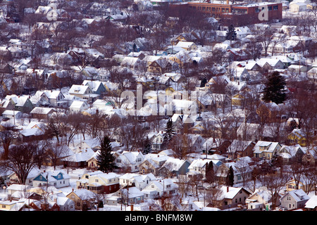 Seen from high above on a bluff, the town of La Crosse, WI is coated in winter snow. Stock Photo