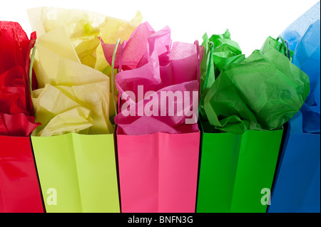 MultiColored Gift Bags with colorful tissue studio image Stock Photo