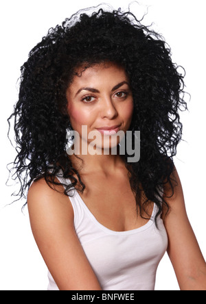 Young, mixed-race woman with black, curly hair. Stock Photo