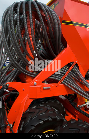 Feeding tubes on an agricultural cultivator. Stock Photo