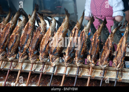 Traditional bavarian 'Steckerlfisch'  on the Oktoberfest, Munich, Germany Stock Photo