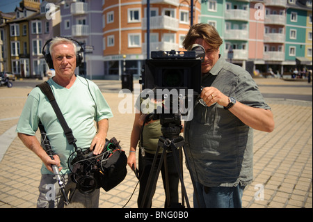 Video cameraman and sound recordist working, Aberystwyth Ceredigion Wales UK Stock Photo