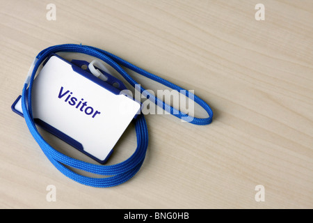 a visitors badge in a holder Stock Photo