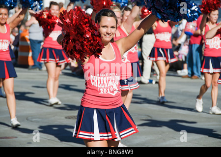 Cheerleaders from Black Hills High School march in the Grand Parade during the Lakefair Celebration in Olympia, Washington. Stock Photo