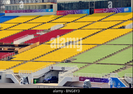 Rows of coloured seats form the grandstand by Marina Bay for the Youth Olympics 2010 in Singapore Stock Photo