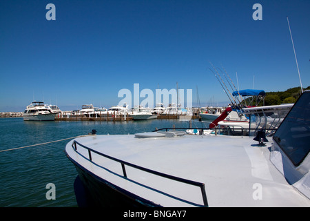 Boats docked in harbor of Historic Fish Town Leland Michigan USA Stock Photo