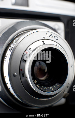 Close up to the lens of a vintage Photo Camera Stock Photo