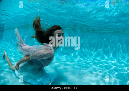 13 year old girl underwater in swimming pool, Kauai, Hawaii Stock Photo ...