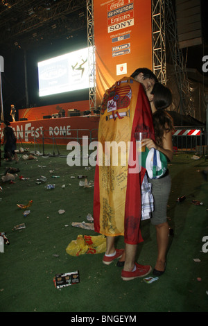 spanish supporters celebrating the victory over holland in the world cup final at the fan fest village in rome, italy July 2010 Stock Photo