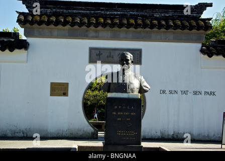 Statue of Dr.Sun Yat Sen at entrance to classical Chinese garden park Chinatown Vancouver BC Stock Photo