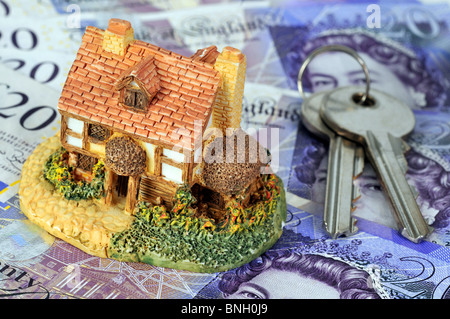 Mortgage, home or house with keys and money, buy, sell, property mortgage Stock Photo