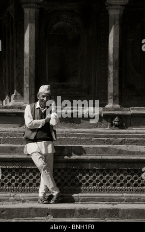 Local man on the phone in Bhaktapur, Nepal Stock Photo