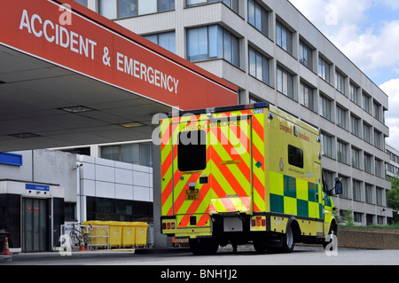 NHS SOS uk emergency ambulance at a London A&E National Health Service hospital entrance for Accident & Emergency department admissions England UK Stock Photo
