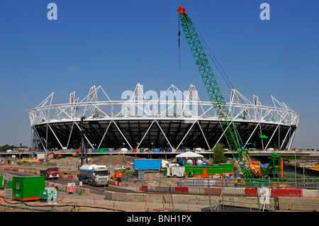 Crane at Stratford 2012 Olympic & Paralympic Games sports stadium building industry construction site work in progress Newham East London England UK Stock Photo