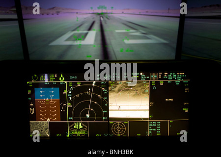 Glowing simulator cockpit instrumentation of a Lockheed Martin F-35 Lightning II stealth fighter. Stock Photo