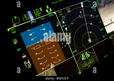 Glowing simulator cockpit instrumentation of a Lockheed Martin F-35 Lightning II stealth fighter. Stock Photo