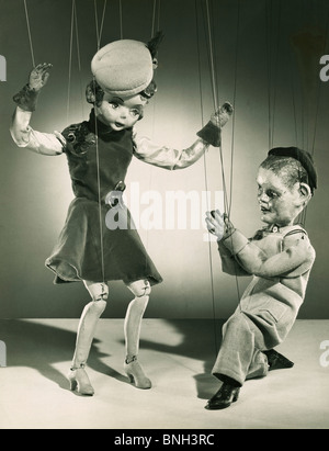 Two marionettes dancing Stock Photo