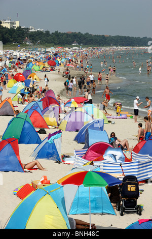Seaside resort Binz on the island of Ruegen, northeast Germany at the baltic sea. Summertime, full beaches. Stock Photo