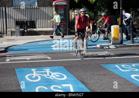 Cyclists on the Barclays Cycle Superhighway CS7 which runs between the City of London and Colliers Wood in Merton, London, SE1. Stock Photo