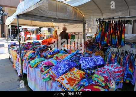 A booth at an art fair selling tie dye shirts Stock Photo - Alamy