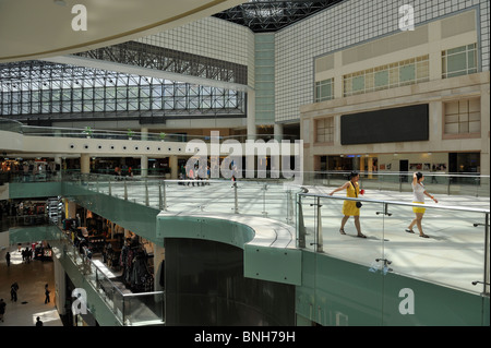 The atrium of Raffles City Shopping Mall, Singapore Stock Photo - Alamy
