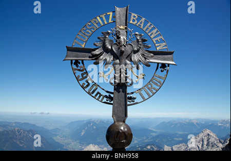 The Zugspitze Railway's crest with the Tyrolean cross on the summit of Zugspitze, Garmisch-Partenkirchen, Bavaris, Germany. Stock Photo