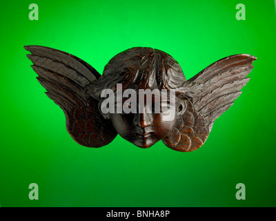 carved angel's head and wings Stock Photo