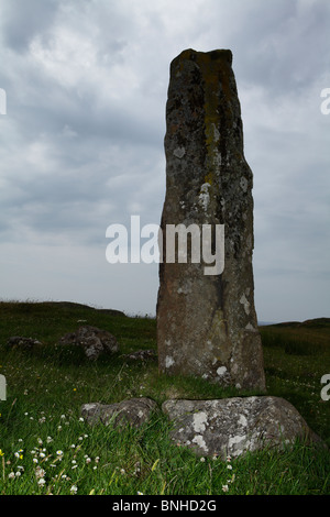 A Standing stone on the Isle of Mull near Dun Ara, moodily lit. Stock Photo