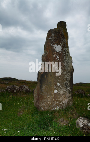 A Standing stone on the Isle of Mull near Dun Ara, moodily lit. Stock Photo