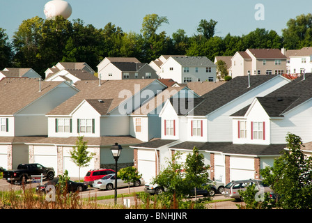 View of multiple family residences in a suburban neighborhood. Stock Photo