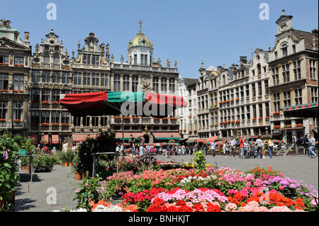 The Grand Place  Grote Markt UNESCO World Heritage Site Central square or plaza in Brussels Belgium Europe flower stall Stock Photo