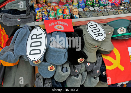 Peaked cap Caps Hats Soviet DDR GDR Military Nostalgia Army Uniform Uniforms Souvenirs Checkpoint Charlie Berlin city Germany Stock Photo