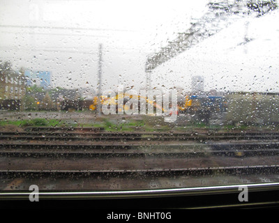 Rainy abstract view from train window Stock Photo