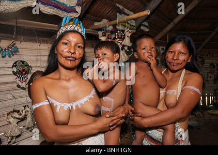 Pevas Peru Amazon rainforest Amazonia Jungle forest river tropics tropical indigenous Americans Huitoto people native natives Stock Photo