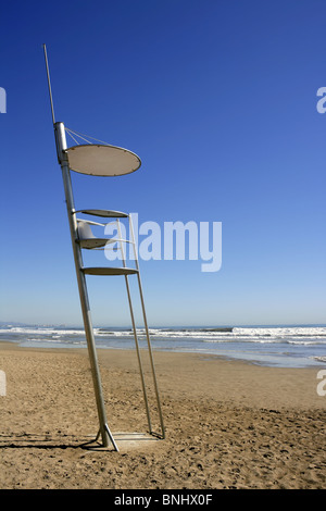 Bay watch high chair sand beach in Valencia Spain blue sky Stock Photo