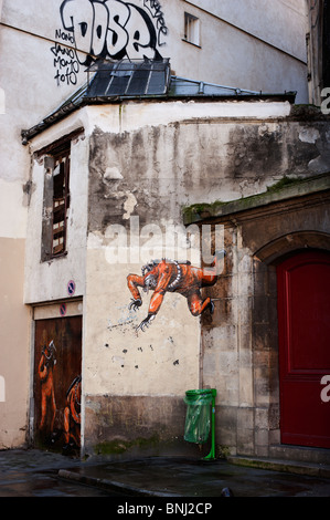 Graffiti on the walls near the Centre Pompidou in Paris. Stock Photo