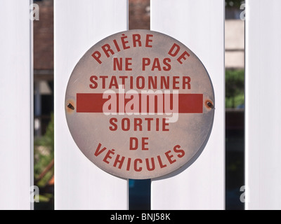 French no parking / way out for cars warning sign. Stock Photo