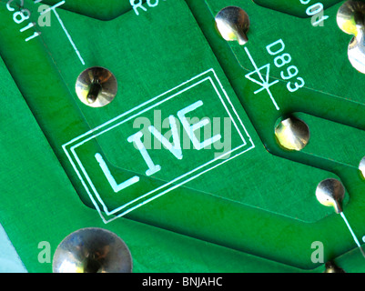 Detail of printed circuit board from a television. "Live" Stock Photo