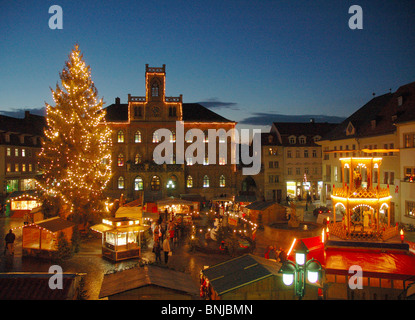 Germany Thuringia Weimar Christmas market city hall dusk twilight Christmas tree states people pyramid lights Stock Photo