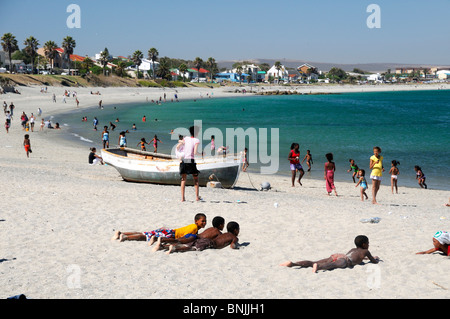 Sandy Beach local locals natives native Saldanha Bay Saldanha Western Cape South Africa white sand coast shore ocean sea people Stock Photo