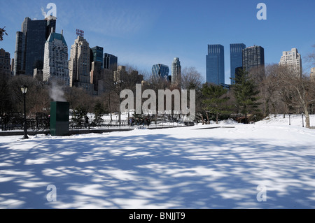 Winter Snow Central Park Manhattan New York USA skyline city travel american urban Stock Photo