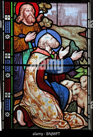 A stained glass window by Frank Holt of Warwick depicting two disciples, Church of St Laurence, Lighthorne, Warwickshire, England Stock Photo