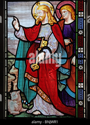 A stained glass window by Frank Holt of Warwick depicting Jesus, Church of St Laurence, Lighthorne, Warwickshire, England. Charge to Saint Peter. Stock Photo
