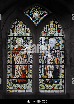 A stained glass window depicting Saint Matthew and Saint James the Greater, Parish Church of St James the Great, Snitterfield; Artist Frank Holt & Co Stock Photo