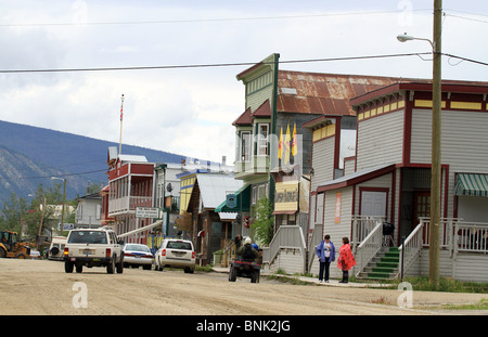 City street in Dawson City, Yukon Territory, Canada. Old buildings and dirt roads. Stock Photo